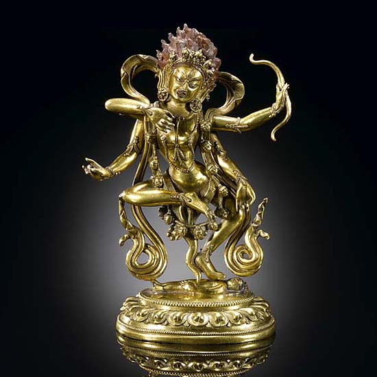 A SINO-TIBETAN GILT-BRONZE FIGURE OF KURUKULLA (RED TARA)