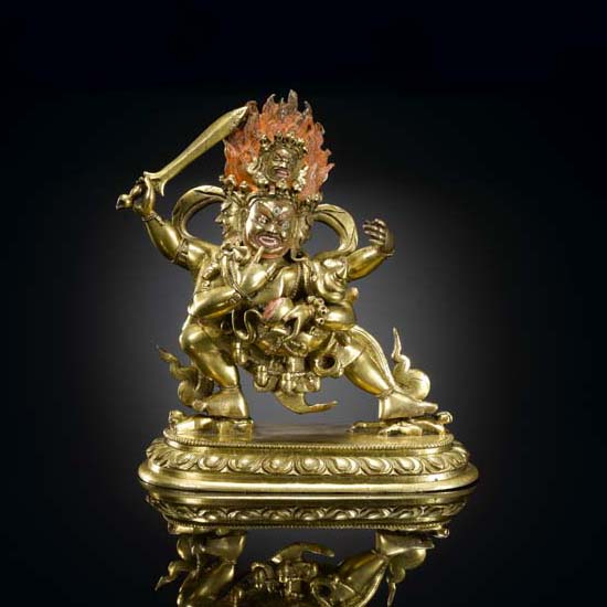 A SINO-TIBETAN GILT-BRONZE FIGURE OF CATURMUKHA MAHAKALA