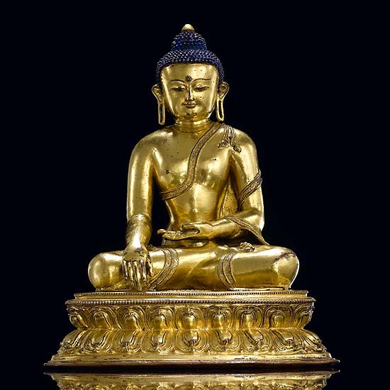 A GILT-BRONZE FIGURE OF SHAKYAMUNI BUDDHA