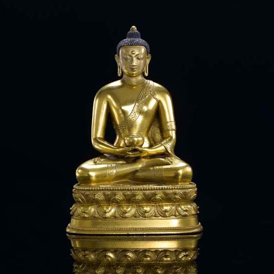 A GILT-BRONZE FIGURE OF AMITABHA BUDDHA