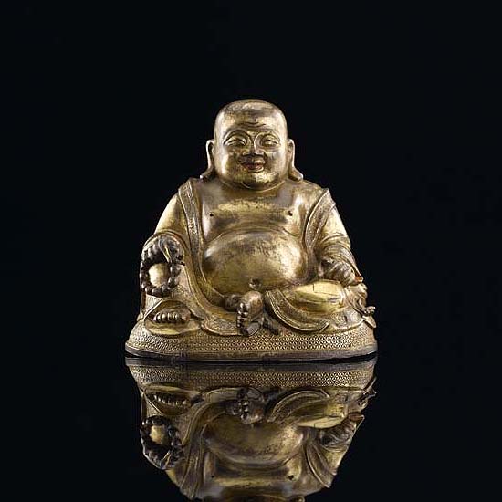 A GILT-BRONZE FIGURE OF BUDAI