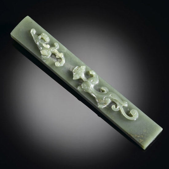 A GREEN JADE SCROLL WEIGHT