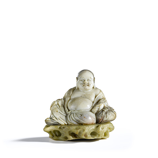 A CARVED SOAPSTONE BUDAI