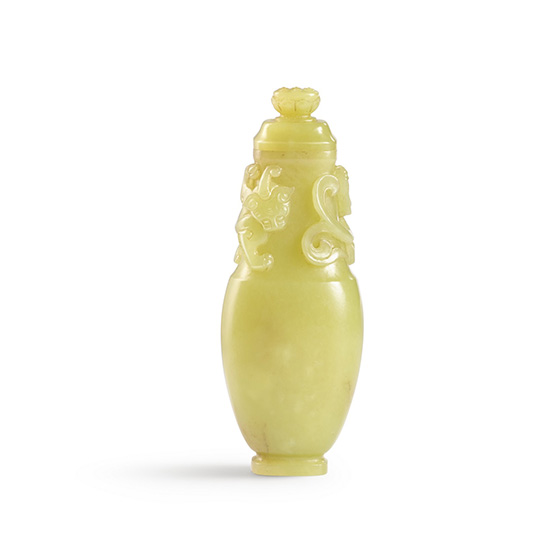 A YELLOW JADE VASE AND COVER