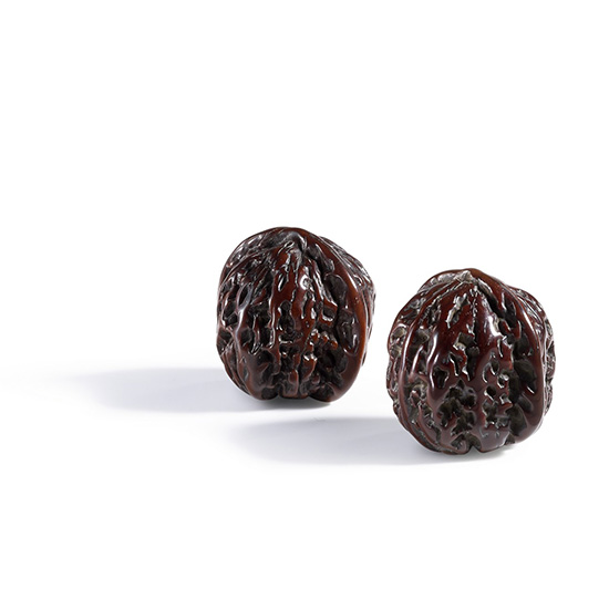 A PAIR OF WALNUTS