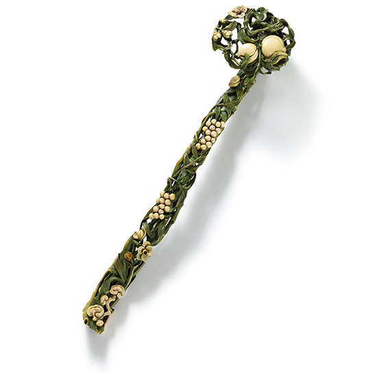 AN IMPERIAL STAINED IVORY RUYI SCEPTRE