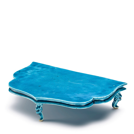 A TURQUOISE-GLAZED STAND