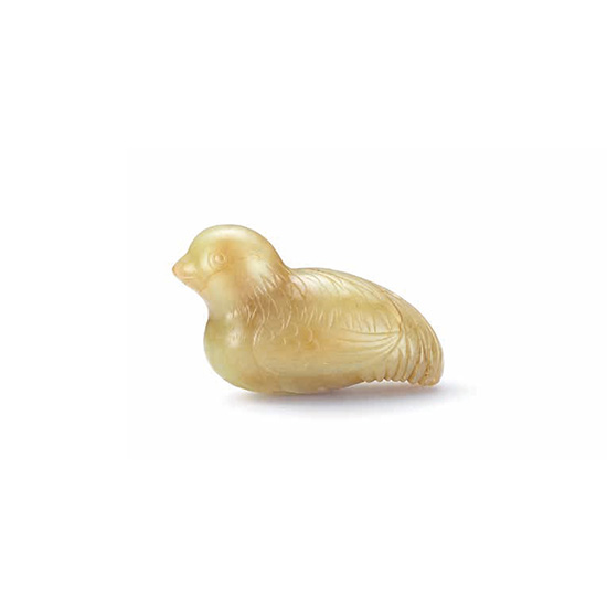 A YELLOW JADE QUAIL