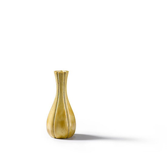 A CARVED MALLOW-SHAPED IVORY VASE