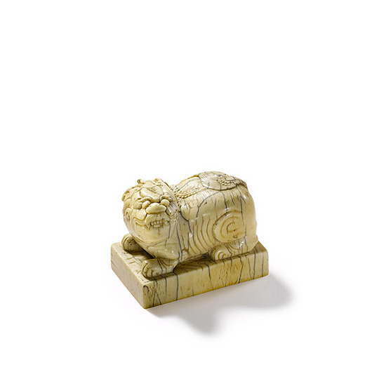 A CARVED IVORY SEAL