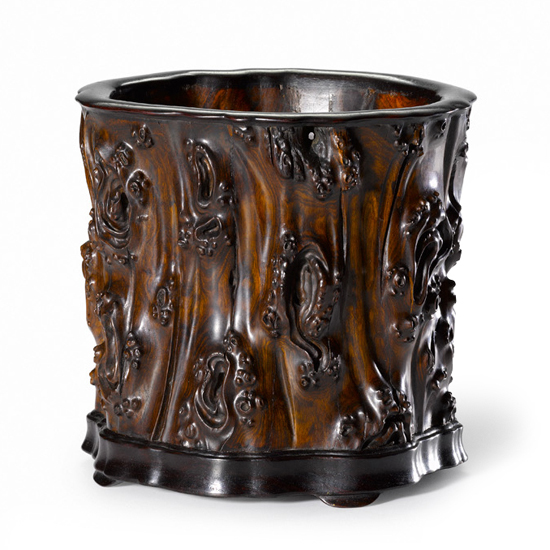 A CARVED HUANGHUALI BRUSHPOT