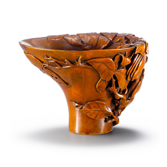 A CARVED BOXWOOD LIBATION CUP