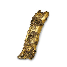 AN IMPERIAL GILT-BRONZE ‘THREE FRIENDS’ WRISTREST