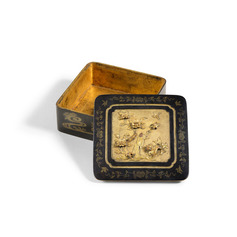 A PARCEL-GILT BRONZE BOX AND COVER